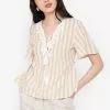 ZALORA BASICS Tassel Detail Lace Up Neck Top